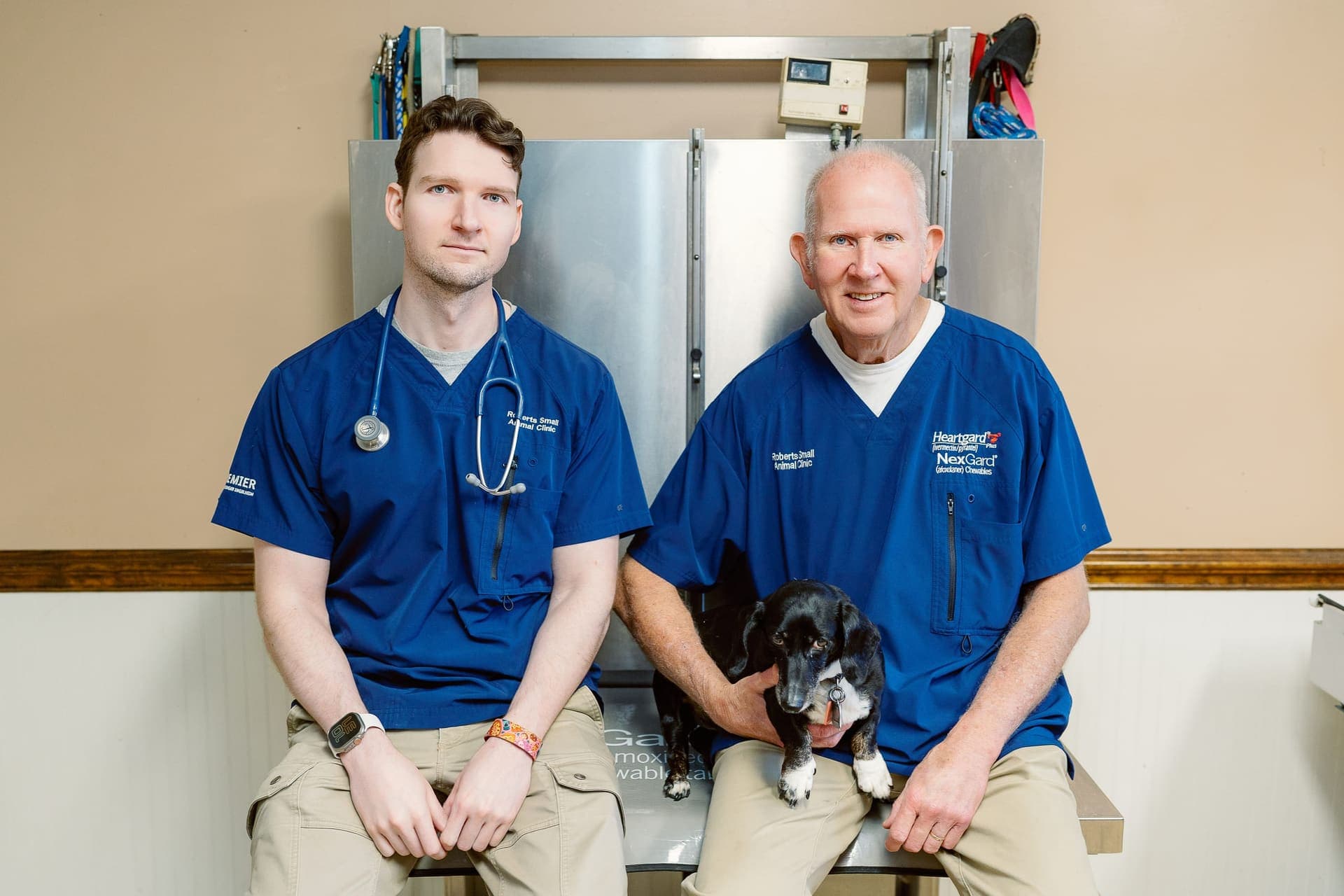Dr. Ryan Roberts and Dr. Allen Roberts with a patient at Roberts Small Animal Clinic